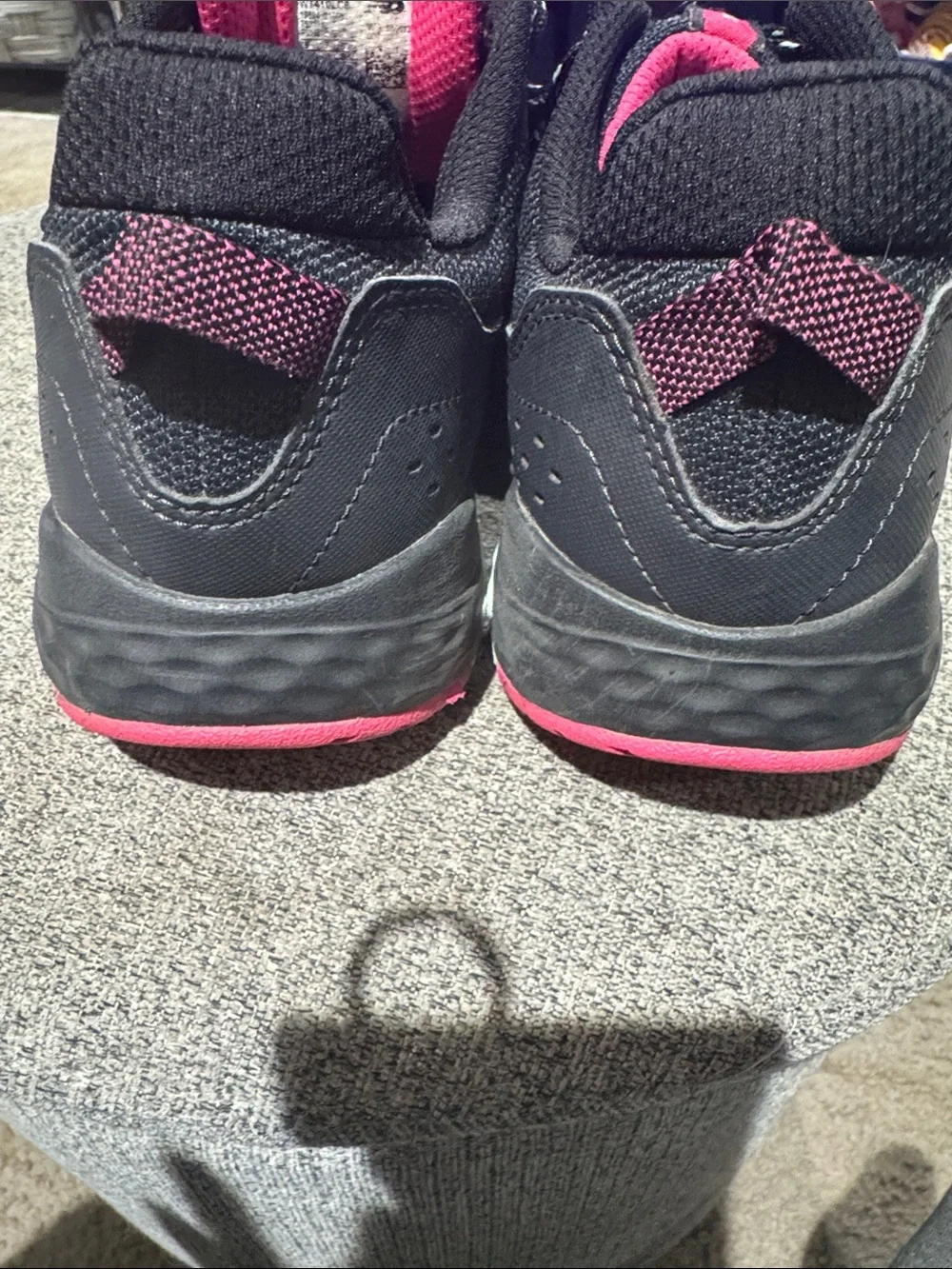 New Balance Women’s Black Athletic Sneakers with Pink and Teal Accents